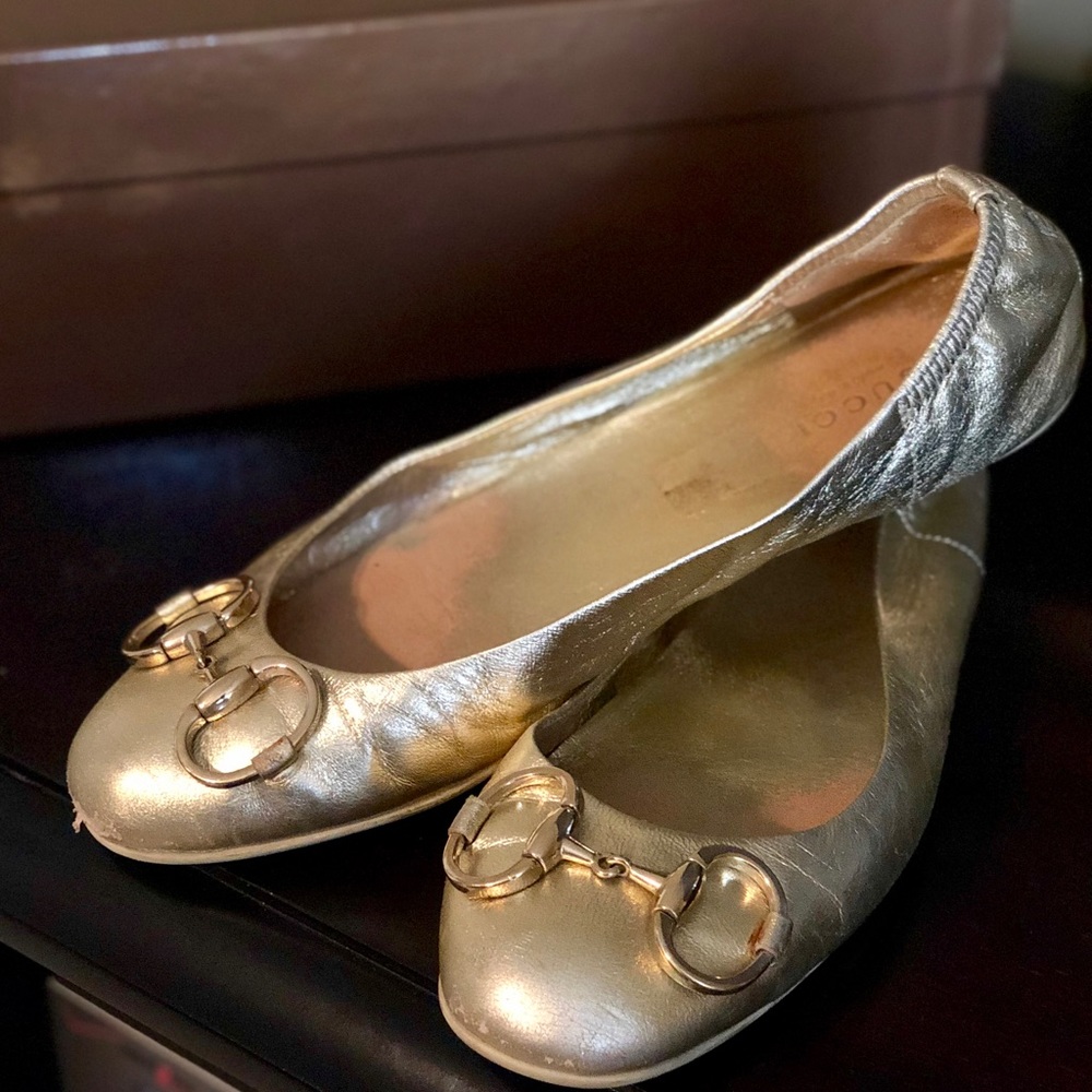 Gucci metallic gold flats